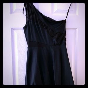 One shoulder black fit and flare Bebe short dress.